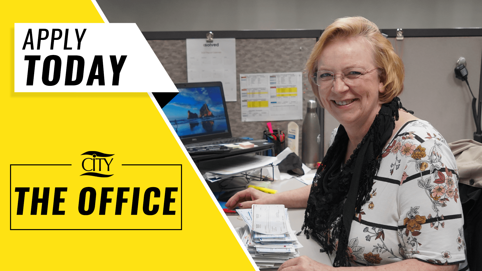 Barb, CITY's Accounting Supervisor, smiling for a picture at her desk in a CITY recruiting advertisement